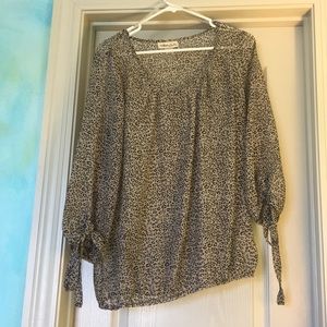 Sheer tan and black print top